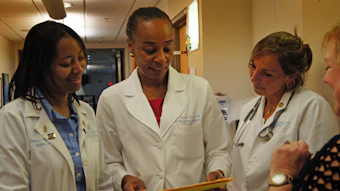 Dr. Brewster with docs